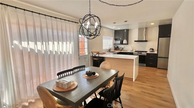 Chandelier, Dining room, Interior, Kitchen, Pendant Lights, Recessed Lighting, Stainless Steel Appliances, Wood Texture Flooring