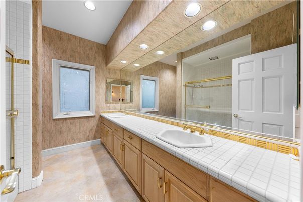 Bathroom, Dual Sink Vanities, Glass Shower, Interior, Recessed Lighting, Tile Countertops