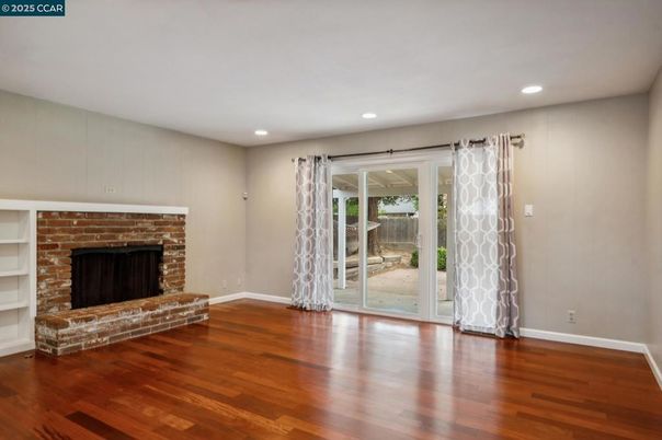 Empty room, Fireplace, Interior, Recessed Lighting, Wood Texture Flooring