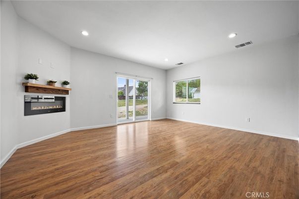 Empty room, Fireplace, Interior, Recessed Lighting, Wood Texture Flooring