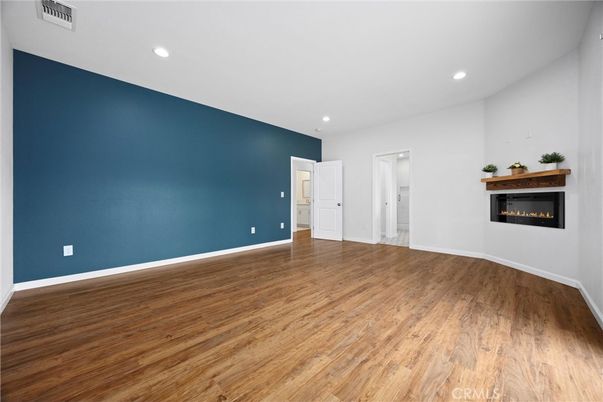 Empty room, Fireplace, Interior, Recessed Lighting, Wood Texture Flooring