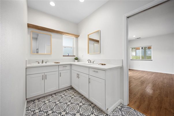 Bathroom, Dual Sink Vanities, Interior, Recessed Lighting, Wood Texture Flooring