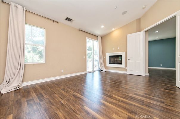 Empty room, Fireplace, Interior, Recessed Lighting, Wood Texture Flooring