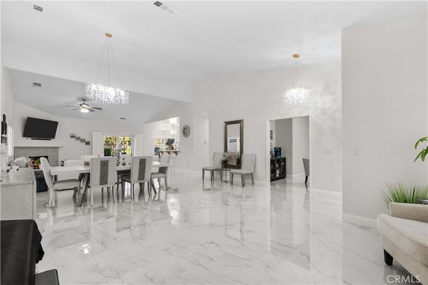 Chandelier, Dining room, Fireplace, Interior, Marble, Pendant Lights