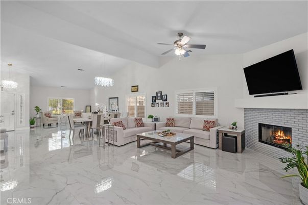 Chandelier, Dining room, Fireplace, Interior, Living room, Marble, Pendant Lights