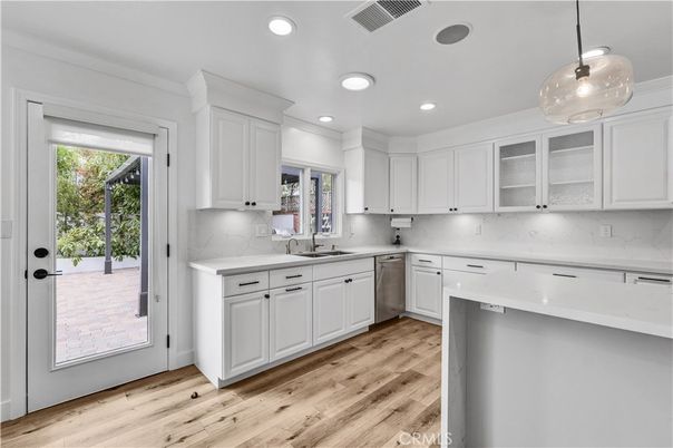 Interior, Kitchen, Marble Walls, Pendant Lights, Recessed Lighting, Wood Texture Flooring