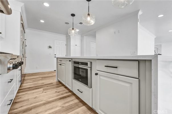 Interior, Kitchen, Pendant Lights, Recessed Lighting, Stainless Steel Appliances, Wood Texture Flooring