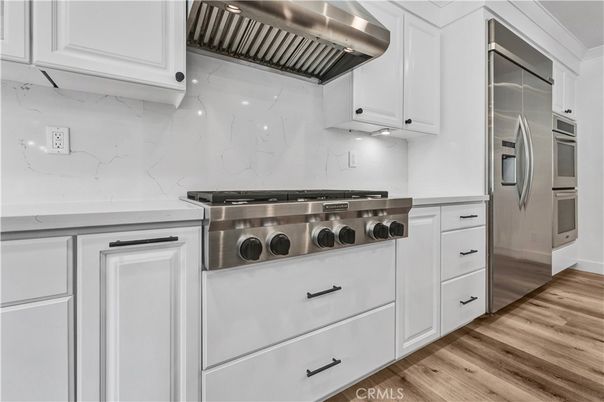 Interior, Kitchen, Marble Walls, Stainless Steel Appliances, Wood Texture Flooring