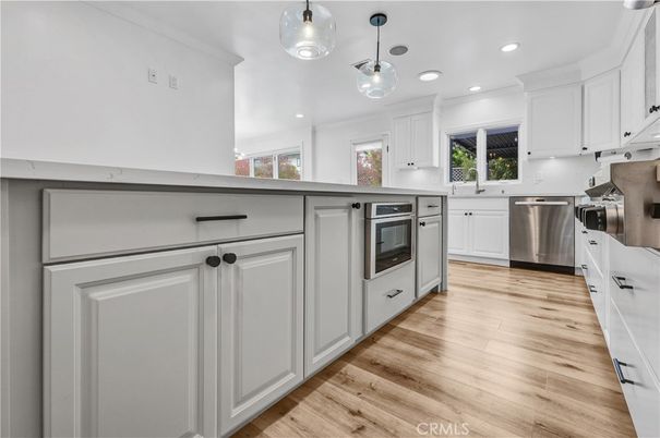 Interior, Kitchen, Pendant Lights, Recessed Lighting, Stainless Steel Appliances, Wood Texture Flooring