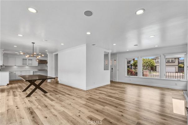 Empty room, Game Room, Interior, Kitchen, Pendant Lights, Recessed Lighting, Wood Texture Flooring