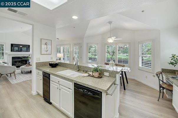 Dining room, Fireplace, Interior, Kitchen, Living room, Recessed Lighting, Wood Texture Flooring