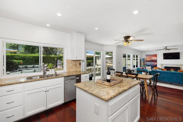 Dining room, Fireplace, Interior, Kitchen, Living room, Recessed Lighting, Wood Texture Flooring