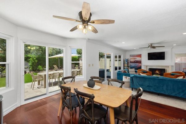 Dining room, Fireplace, Interior, Living room, Recessed Lighting, Wood Texture Flooring