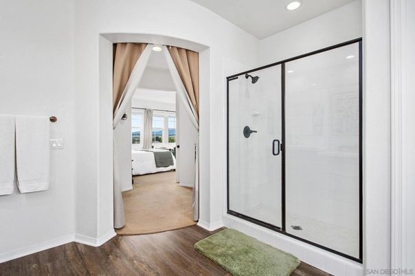Bathroom, Bedroom, Glass Shower, Interior, Recessed Lighting, Wood Texture Flooring