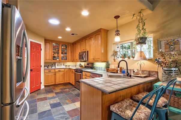 Interior, Kitchen, Pendant Lights, Recessed Lighting, Stainless Steel Appliances, Tile Countertops
