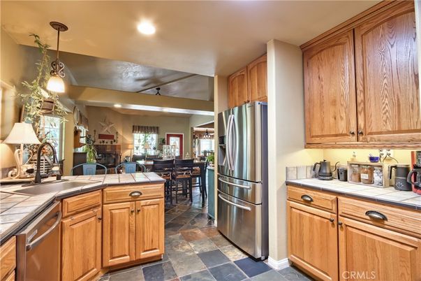 Dining room, Interior, Kitchen, Pendant Lights, Recessed Lighting, Stainless Steel Appliances, Tile Countertops