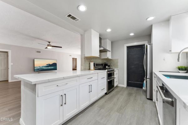 Interior, Kitchen, Recessed Lighting, Stainless Steel Appliances, Wood Texture Flooring