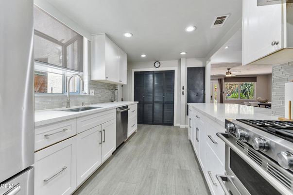 Interior, Kitchen, Recessed Lighting, Stainless Steel Appliances, Wood Texture Flooring