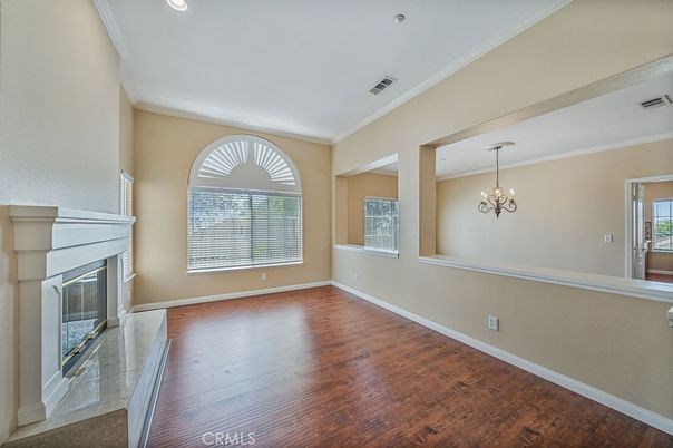 Chandelier, Empty room, Fireplace, Interior, Recessed Lighting, Wood Texture Flooring