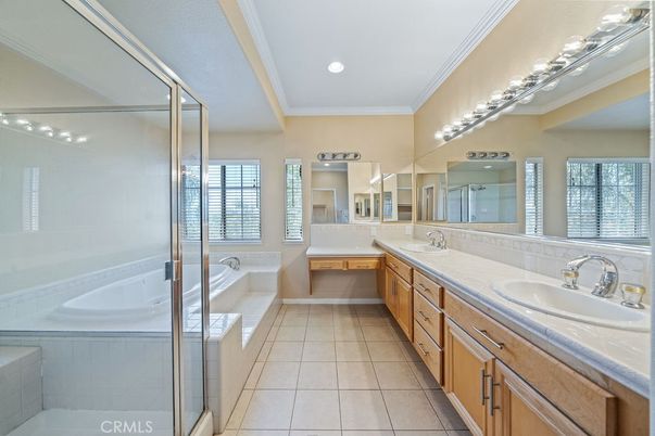Bathroom, Dual Sink Vanities, Glass Shower, Interior, Recessed Lighting, Tile Countertops