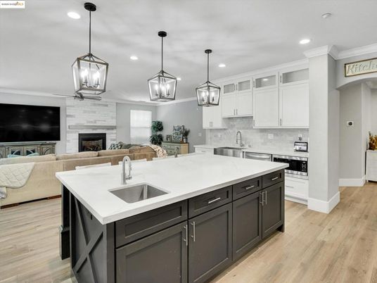Fireplace, Interior, Kitchen, Living room, Pendant Lights, Recessed Lighting, Stainless Steel Appliances, Wood Texture Flooring