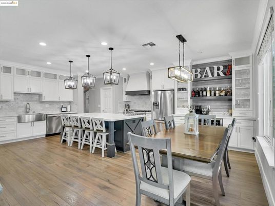 Dining room, Interior, Kitchen, Pendant Lights, Recessed Lighting, Stainless Steel Appliances, Wood Texture Flooring