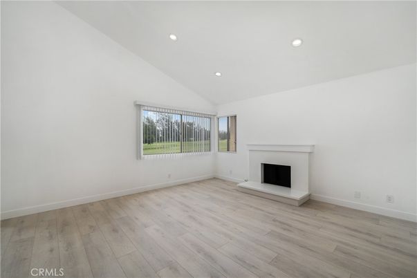 Empty room, Fireplace, Interior, Recessed Lighting, Wood Texture Flooring