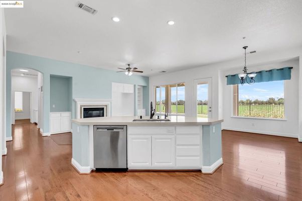 Fireplace, Interior, Kitchen, Pendant Lights, Recessed Lighting, Wood Texture Flooring