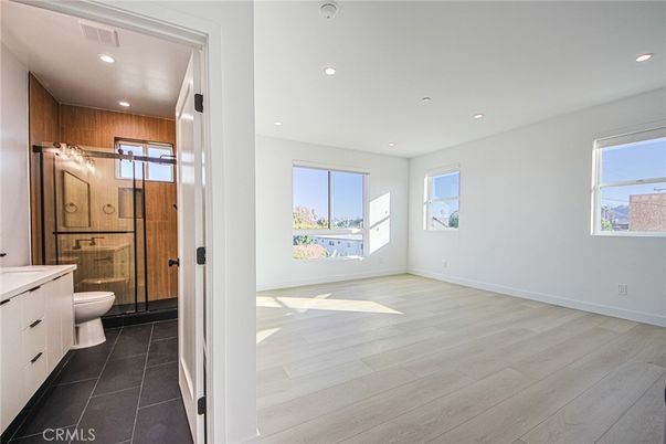 Bathroom, Glass Shower, Interior, Recessed Lighting, Wood Texture Flooring