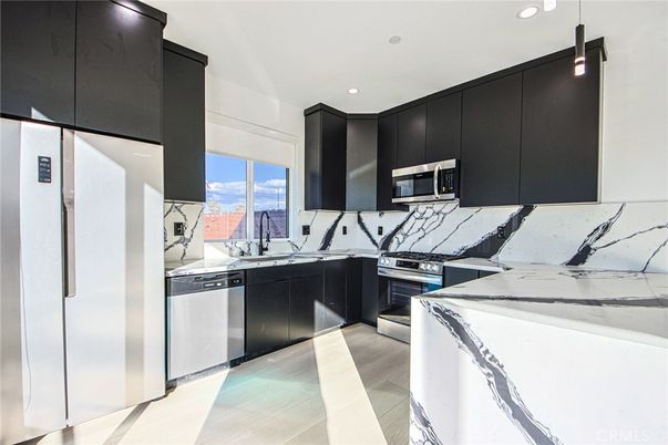 Interior, Kitchen, Pendant Lights, Recessed Lighting, Stainless Steel Appliances, Wood Texture Flooring