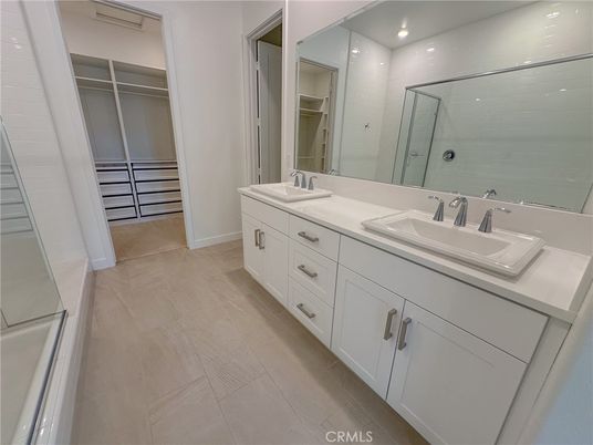 Bathroom, Dual Sink Vanities, Glass Shower, Interior, Recessed Lighting, Walk-in Closets
