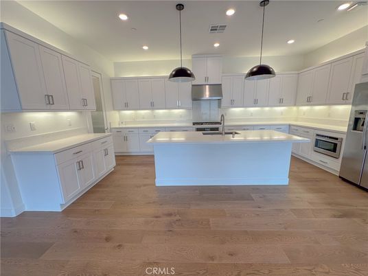 Interior, Kitchen, Pendant Lights, Recessed Lighting, Stainless Steel Appliances, Wood Texture Flooring