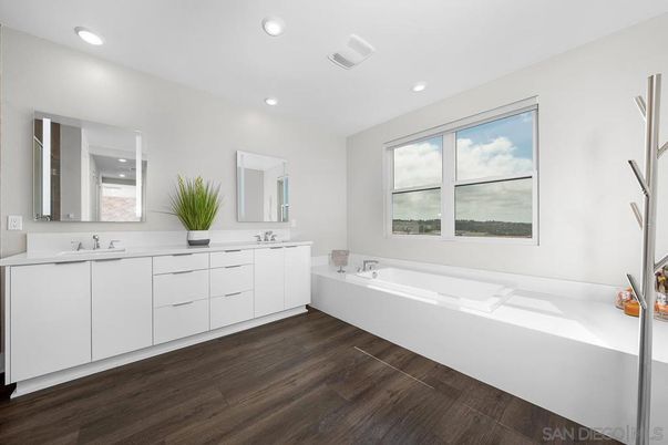 Bathroom, Dual Sink Vanities, Interior, Recessed Lighting, Wood Texture Flooring