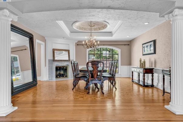 Chandelier, Dining room, Fireplace, Interior, Recessed Lighting, Wood Texture Flooring