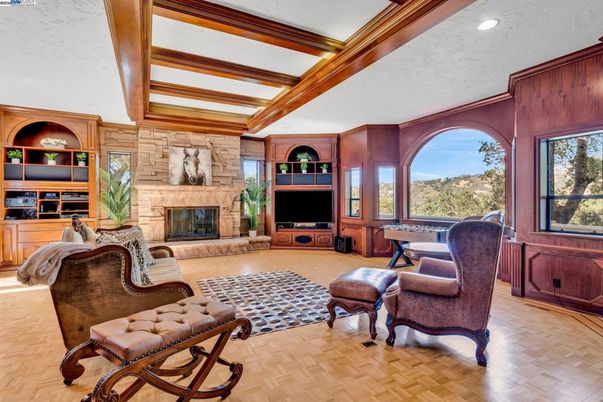 Fireplace, Interior, Living room, Recessed Lighting, Stone Walls, Wooden Beams, Wood Texture Flooring