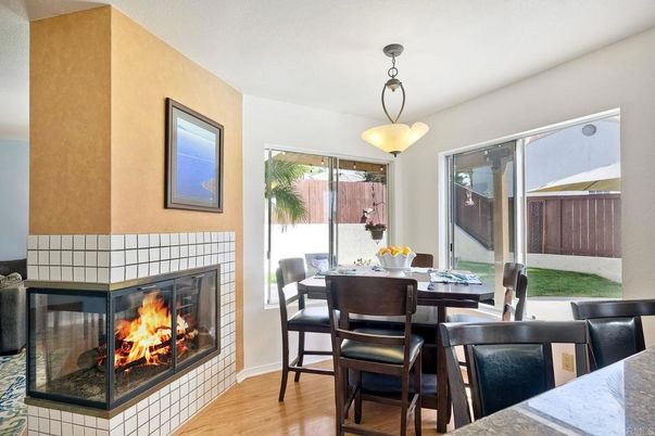 Dining room, Fireplace, Interior, Pendant Lights, Wood Texture Flooring