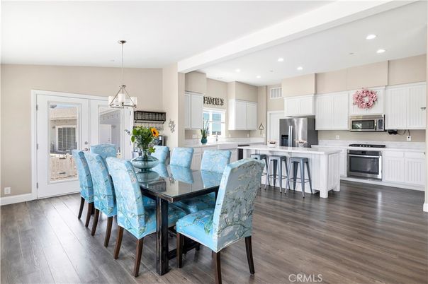 Dining room, Interior, Kitchen, Pendant Lights, Recessed Lighting, Stainless Steel Appliances, Wood Texture Flooring