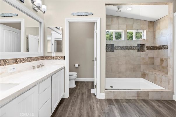 Bathroom, Dual Sink Vanities, Interior, Recessed Lighting, Wood Texture Flooring
