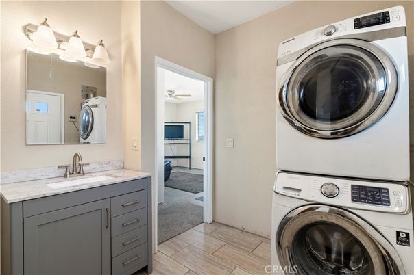 Bathroom, Interior, Utility Closets, Washer, Wood Texture Flooring