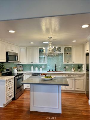 Chandelier, Interior, Kitchen, Recessed Lighting, Stainless Steel Appliances, Wood Texture Flooring