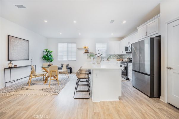 Dining room, Interior, Kitchen, Recessed Lighting, Stainless Steel Appliances, Wood Texture Flooring