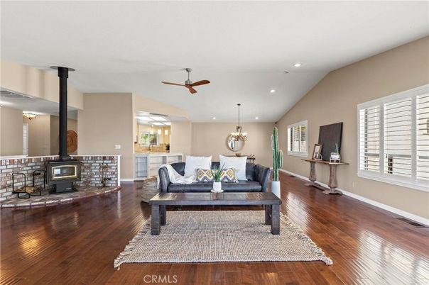 Dining room, Fireplace, Interior, Living room, Recessed Lighting, Wood Texture Flooring
