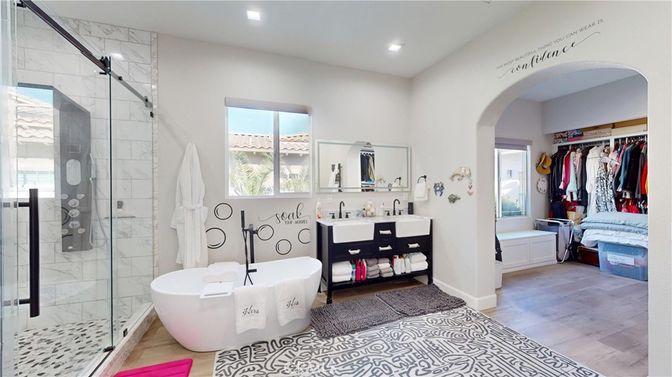 Bathroom, Dual Sink Vanities, Free Standing Baths, Glass Shower, Interior, Marble Walls, Recessed Lighting, Walk-in Closets, Wood Texture Flooring