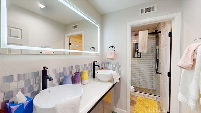 Bathroom, Dual Sink Vanities, Glass Shower, Interior, Wood Texture Flooring