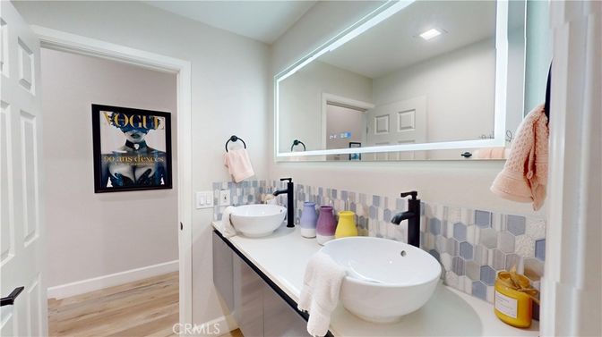 Bathroom, Dual Sink Vanities, Interior, Recessed Lighting, Wood Texture Flooring