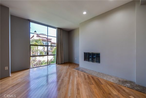 Empty room, Fireplace, Interior, Recessed Lighting, Wood Texture Flooring