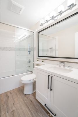 Bathroom, Dual Sink Vanities, Glass Shower, Interior, Wood Texture Flooring
