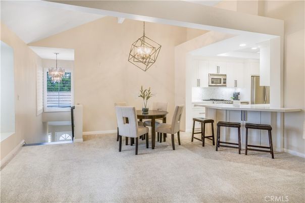 Chandelier, Dining room, Interior, Kitchen, Pendant Lights, Recessed Lighting, Stainless Steel Appliances