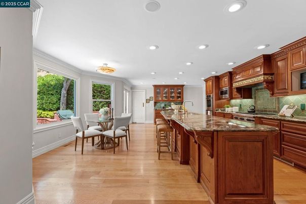 Dining room, Interior, Kitchen, Recessed Lighting, Stainless Steel Appliances, Wood Texture Flooring