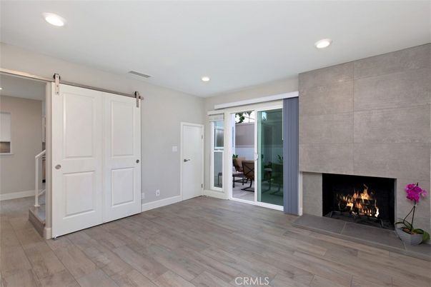 Empty room, Fireplace, Interior, Recessed Lighting, Wood Texture Flooring